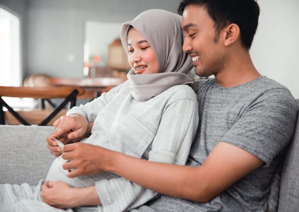 couple looking at ultrasound images